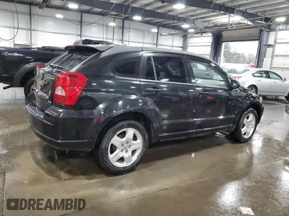 ✅ 2009 Dodge Caliber SXT • VIN: 1B3HB48A49D259194 • Лот: 78402844. Опубликован ранее на Copart с пробегом 164 805 миль. Бесплатный доступ к архиву аукционных продаж из США и подробный отчёт об истории автомобиля на DreamBid. Изображение 3.