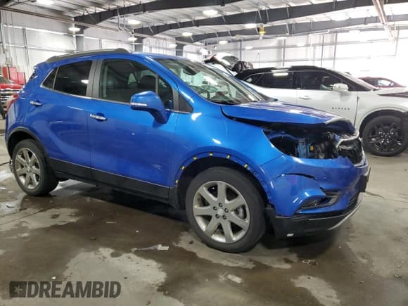 ✅ 2018 Buick Encore Premium • VIN: KL4CJHSB5JB578019 • Лот: 89857195. Опубликован ранее на Copart с пробегом 62 336 миль. Бесплатный доступ к архиву аукционных продаж из США и подробный отчёт об истории автомобиля на DreamBid. Изображение 4.