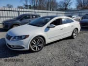 ✅ 2014 Volkswagen CC Executive • VIN: WVWRN7AN1EE506295 • Lot: 46024195. Listed on Copart with 143,535 mi. Free auction sales archive from the USA and detailed vehicle history report at DreamBid. Image 1.