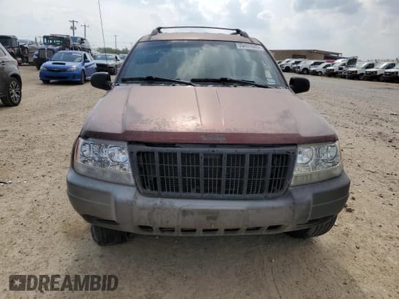 ✅ 1999 Jeep Grand Cherokee Laredo • VIN: 1J4G258S0XC563922 • Лот: 55491645. Опубликован ранее на Copart с пробегом Не указан. Бесплатный доступ к архиву аукционных продаж из США и подробный отчёт об истории автомобиля на DreamBid. Изображение 5.