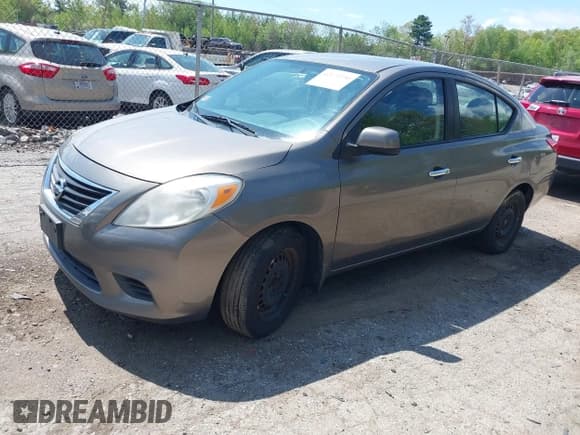 ✅ 2012 Nissan Versa SV • VIN: 3N1CN7AP2CL881944 • Lot: 42172550. Listed on IAAI with 159,299 mi. Free auction sales archive from the USA and detailed vehicle history report at DreamBid. Image 2.
