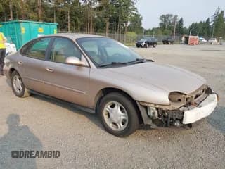 ✅ 1996 Ford Taurus GL • VIN: 1FALP52UXTG106219 • Lot: 43140766. Listed on IAAI with 152,386 mi. Free auction sales archive from the USA and detailed vehicle history report at DreamBid. Image 1.