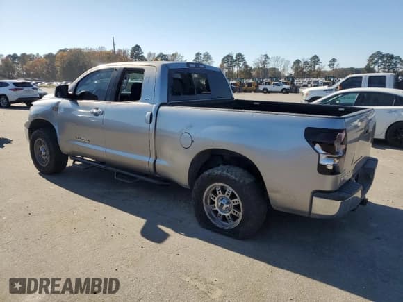 ✅ 2010 Toyota Tundra • VIN: 5TFRY5F12AX088278 • Lot: 92477255. Listed on Copart with 137,321 mi. Free auction sales archive from the USA and detailed vehicle history report at DreamBid. Image 2.
