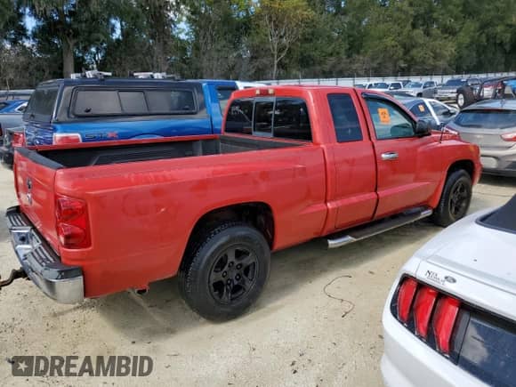 2006 Dodge Dakota SLT z VIN 1D7HE42N76S510319, wystawiony jako Copart lot #75268694 z przebiegiem Nie podano mil oraz Nie do naprawy • Non repairable. Historia ofert i sprzedaży dostępna na DreamBid. Obrazek 3.