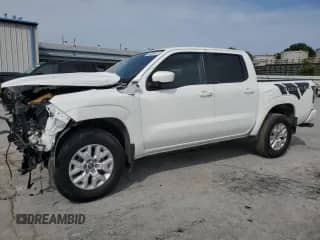 2022 Nissan Frontier SV with VIN 1N6ED1EK9NN614949, listed as a Copart auction lot 71836945 with 23,303 mi miles and Salvage title. Bid and sale history available at DreamBid. Image 1.