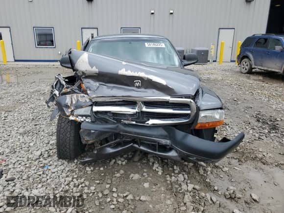 2004 Dodge Dakota Sport z VIN 1D7GL32NX4S584715, wystawiony jako Copart lot #54146225 z przebiegiem Nie podano mil oraz Nie do naprawy • Non repairable. Historia ofert i sprzedaży dostępna na DreamBid. Obrazek 5.