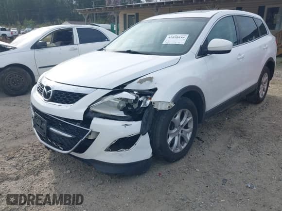 ✅ 2011 Mazda CX-9 Touring • VIN: JM3TB3CV9B0312697 • Lot: 41898844. Listed on IAAI with 188,633 mi. Free auction sales archive from the USA and detailed vehicle history report at DreamBid. Image 6.