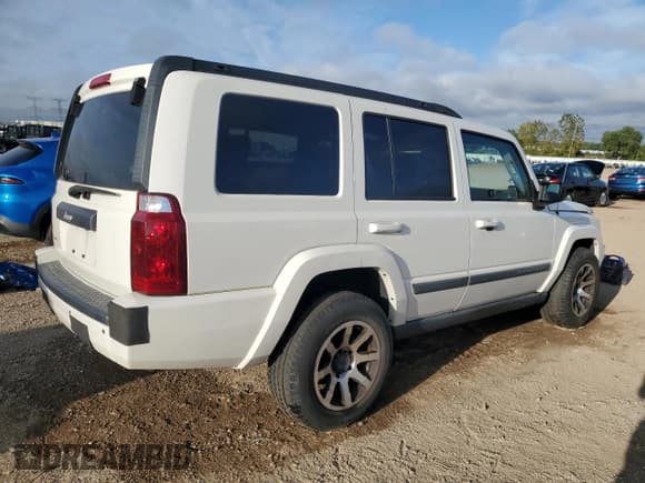 ✅ 2009 Jeep Commander Sport • VIN: 1J8HG48K79C541353 • Lot: 83828235. Listed on Copart with 128,347 mi. Free auction sales archive from the USA and detailed vehicle history report at DreamBid. Image 3.