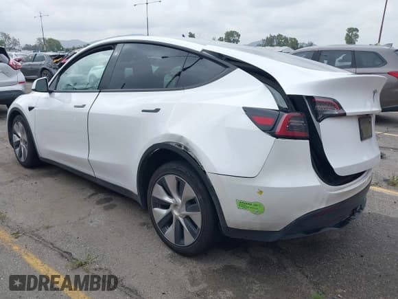 ✅ 2023 Tesla Model Y Long Range • VIN: 7SAYGAEE9PF702910 • Lot: 42199519. Wystawiony na IAAI z przebiegiem 91 094 mil. Bezpłatny archiwum sprzedaży aukcyjnych z USA i szczegółowy raport historii pojazdu na DreamBid. Zdjęcie 3.