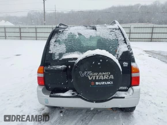 ✅ 2000 Suzuki Grand Vitara JLX • VIN: JS3TD62V9Y4125906 • Lot: 41202351. Listed on IAAI with 146,300 mi. Free auction sales archive from the USA and detailed vehicle history report at DreamBid. Image 16.