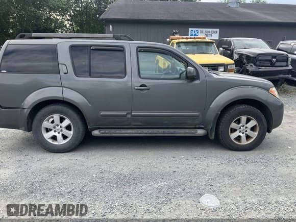 ✅ 2009 Nissan Pathfinder SE • VIN: 5N1AR18B79C615786 • Lot: 42945644. Listed on IAAI with 65,037 mi. Free auction sales archive from the USA and detailed vehicle history report at DreamBid. Image 14.