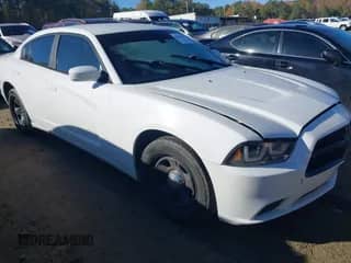 2014 Dodge Charger Police with VIN 2C3CDXAG5EH166950, listed as a IAAI auction lot 43613008 with 121,734 mi miles and . Bid and sale history available at DreamBid. Image 1.