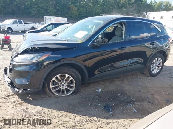 ✅ 2021 Ford Escape SE • VIN: 1FMCU9G6XMUA60930 • Lot: 43121553. Listed on IAAI with 99,283 mi. Free auction sales archive from the USA and detailed vehicle history report at DreamBid. Image 15.
