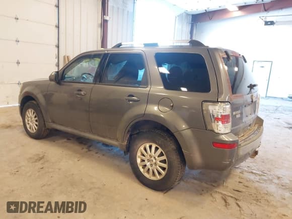 ✅ 2010 Mercury Mariner Premier • VIN: 4M2CN9HGXAKJ11983 • Lot: 41512060. Listed on IAAI with 154,971 mi. Free auction sales archive from the USA and detailed vehicle history report at DreamBid. Image 3.