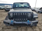 ✅ 2022 Jeep Wrangler Unlimited Sahara High Altitude • VIN: 1C4JJXP60NW214074 • Lot: 49331115. Listed on Copart with 25,858 mi. Free auction sales archive from the USA and detailed vehicle history report at DreamBid. Image 5.