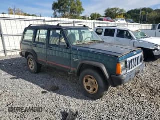 ✅ 1995 Jeep Cherokee Sport • VIN: 1J4FJ68S5SL514616 • Lot: 70411215. Wystawiony na Copart z przebiegiem 132 365 mil. Bezpłatny archiwum sprzedaży aukcyjnych z USA i szczegółowy raport historii pojazdu na DreamBid. Zdjęcie 4.