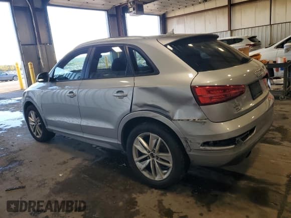 ✅ 2017 Audi Q3 Premium • VIN: WA1ECCFS1HR006916 • Лот: 85907635. Опубликован ранее на Copart с пробегом 81 089 миль. Бесплатный доступ к архиву аукционных продаж из США и подробный отчёт об истории автомобиля на DreamBid. Изображение 2.
