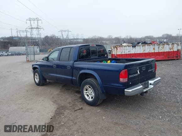✅ 2003 Dodge Dakota SLT • VIN: 1D7HL48X23S261258 • Lot: 41362485. Wystawiony na IAAI z przebiegiem 143 397 mil. Bezpłatny archiwum sprzedaży aukcyjnych z USA i szczegółowy raport historii pojazdu na DreamBid. Zdjęcie 3.