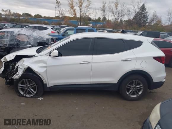 ✅ 2018 Hyundai Santa Fe 2.4L • VIN: 5NMZT3LB1JH057936 • Лот: 43505515. Опубликован ранее на IAAI с пробегом 152 899 миль. Бесплатный доступ к архиву аукционных продаж из США и подробный отчёт об истории автомобиля на DreamBid. Изображение 15.