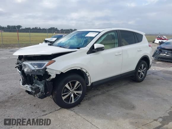 ✅ 2018 Toyota RAV4 XLE • VIN: 2T3WFREV2JW512910 • Lot: 42772049. Listed on IAAI with 138,019 mi. Free auction sales archive from the USA and detailed vehicle history report at DreamBid. Image 18.