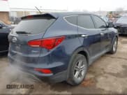 ✅ 2018 Hyundai Santa Fe 2.4L • VIN: 5XYZT3LB8JG557635 • Лот: 42227594. Опубликован ранее на IAAI с пробегом 130 913 миль. Бесплатный доступ к архиву аукционных продаж из США и подробный отчёт об истории автомобиля на DreamBid. Изображение 4.