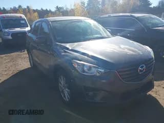 ✅ 2016 Mazda CX-5 Touring • VIN: JM3KE4CYXG0803533 • Lot: 43509732. Wystawiony na IAAI z przebiegiem 71 842 mil. Bezpłatny archiwum sprzedaży aukcyjnych z USA i szczegółowy raport historii pojazdu na DreamBid. Zdjęcie 1.