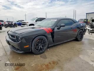 2013 Dodge Challenger R/T with VIN 2C3CDYBT4DH671037, listed as a Copart auction lot 69820635 with 135,364 mi miles and Clean title. Bid and sale history available at DreamBid. Image 1.