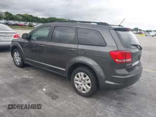 2014 Dodge Journey SE z VIN 3C4PDCAB0ET284048, wystawiony jako IAAI lot #43436446 z przebiegiem 164 883 mil mil oraz . Historia ofert i sprzedaży dostępna na DreamBid. Obrazek 3.