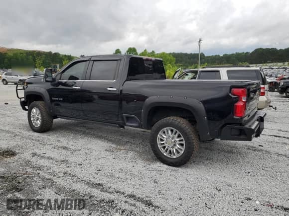 2022 Chevrolet Silverado 2500HD High Country with VIN 1GC4YREY8NF203395, listed as a Copart auction lot 58822955 with 129,552 mi miles and Salvage title. Bid and sale history available at DreamBid. Image 2.
