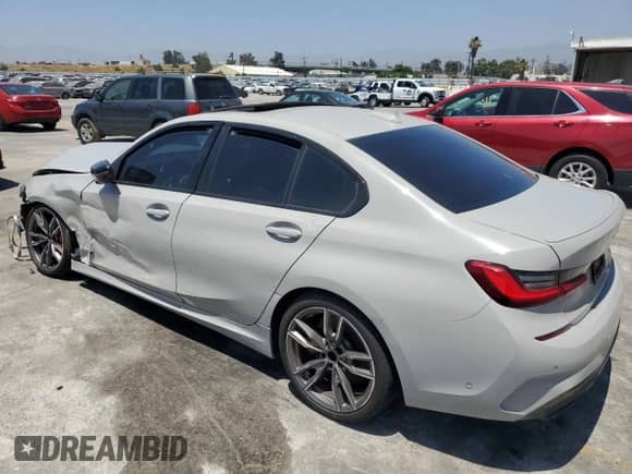2021 BMW 3 Series M340i with VIN WBA5U7C01MFL29708, listed as a Copart auction lot 60253554 with Not provided miles and Clean title. Bid and sale history available at DreamBid. Image 2.