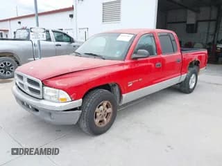 ✅ 2002 Dodge Dakota SLT • VIN: 1B7HL48X92S664369 • Lot: 41911507. Wystawiony na IAAI z przebiegiem 219 445 mil. Bezpłatny archiwum sprzedaży aukcyjnych z USA i szczegółowy raport historii pojazdu na DreamBid. Zdjęcie 2.