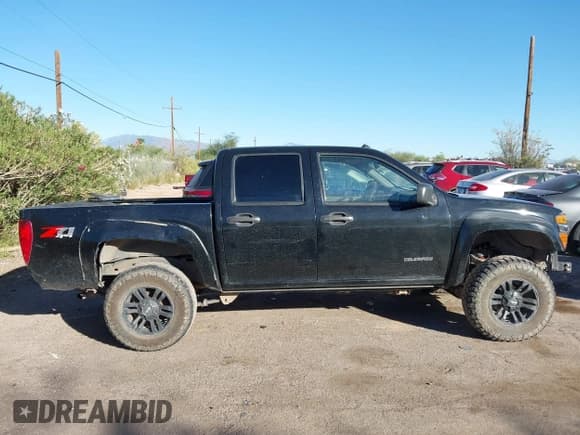 ✅ 2004 Chevrolet Colorado 1SF LS Z71 • VIN: 1GCDT136548220675 • Лот: 43565152. Опубликован ранее на IAAI с пробегом 268 330 миль. Бесплатный доступ к архиву аукционных продаж из США и подробный отчёт об истории автомобиля на DreamBid. Изображение 13.