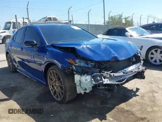 2023 Toyota Camry SE z VIN 4T1T11AKXPU142516, wystawiony jako IAAI lot #42605747 z przebiegiem 36 430 mil mil oraz . Historia ofert i sprzedaży dostępna na DreamBid. Obrazek 1.