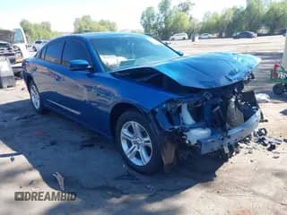 2021 Dodge Charger SXT with VIN 2C3CDXBGXMH530275, listed as a IAAI auction lot 43151728 with 50,617 mi miles and . Bid and sale history available at DreamBid. Image 1.