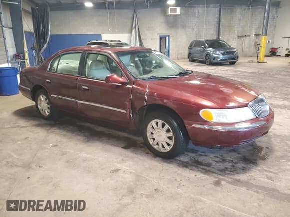 ✅ 2001 Lincoln Continental • VIN: 1LNHM97V11Y685878 • Lot: 61347335. Listed on Copart with 109,549 mi. Free auction sales archive from the USA and detailed vehicle history report at DreamBid. Image 4.