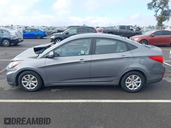 ✅ 2013 Hyundai Accent GLS • VIN: KMHCT4AE3DU531256 • Lot: 43722406. Listed on IAAI with 145,190 mi. Free auction sales archive from the USA and detailed vehicle history report at DreamBid. Image 14.