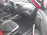 ✅ 2013 Hyundai Veloster Turbo • VIN: KMHTC6AE3DU096959 • Lot: 41749843. Wystawiony na IAAI z przebiegiem 87 662 mil. Bezpłatny archiwum sprzedaży aukcyjnych z USA i szczegółowy raport historii pojazdu na DreamBid. Zdjęcie 5.