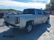 ✅ 2018 Chevrolet Silverado 1500 LT • VIN: 3GCPCREH6JG359777 • Лот: 41377806. Опубликован ранее на IAAI с пробегом 133 611 миль. Бесплатный доступ к архиву аукционных продаж из США и подробный отчёт об истории автомобиля на DreamBid. Изображение 4.