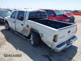 ✅ 2004 Dodge Dakota SLT • VIN: 1D7HL48K34S758499 • Lot: 42035062. Wystawiony na IAAI z przebiegiem 145 305 mil. Bezpłatny archiwum sprzedaży aukcyjnych z USA i szczegółowy raport historii pojazdu na DreamBid. Zdjęcie 3.