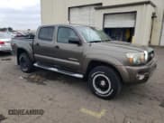 ✅ 2011 Toyota Tacoma • VIN: 3TMLU4EN1BM057479 • Lot: 85938495. Listed on Copart with 86,574 mi. Free auction sales archive from the USA and detailed vehicle history report at DreamBid. Image 4.