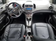 ✅ 2012 Chevrolet Sonic LTZ • VIN: 1G1JE6SH7C4123988 • Lot: 64845065. Listed on Copart with 130,139 mi. Free auction sales archive from the USA and detailed vehicle history report at DreamBid. Image 8.