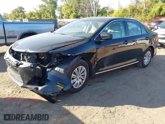 ✅ 2014 Toyota Camry XLE • VIN: 4T1BF1FK9EU461361 • Lot: 43409800. Listed on IAAI with 257,240 mi. Free auction sales archive from the USA and detailed vehicle history report at DreamBid. Image 2.