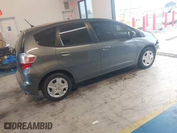 ✅ 2012 Honda Fit • VIN: JHMGE8H38CS001465 • Lot: 42706750. Listed on IAAI with 177,734 mi. Free auction sales archive from the USA and detailed vehicle history report at DreamBid. Image 4.