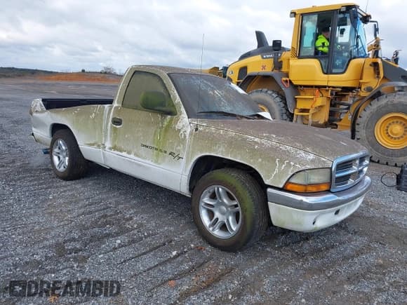 ✅ 1998 Dodge Dakota SLT • VIN: 1B7FL26Y5WS583852 • Lot: 43892080. Listed on IAAI with 119,909 mi. Free auction sales archive from the USA and detailed vehicle history report at DreamBid. Image 1.