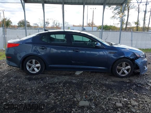 ✅ 2015 Kia Optima LX • VIN: 5XXGM4A76FG483653 • Lot: 43582972. Listed on IAAI with 126,627 mi. Free auction sales archive from the USA and detailed vehicle history report at DreamBid. Image 13.