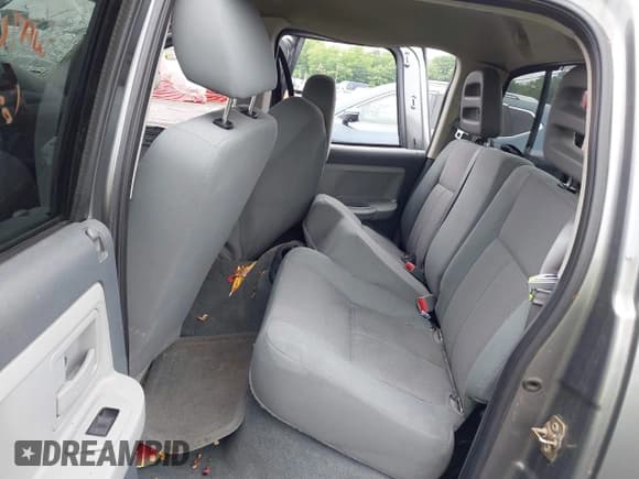 ✅ 2005 Dodge Dakota SLT • VIN: 1D7HW48N55S338679 • Lot: 42525904. Listed on IAAI with 107,988 mi. Free auction sales archive from the USA and detailed vehicle history report at DreamBid. Image 8.