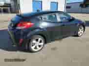 2012 Hyundai Veloster w/Red Int z VIN KMHTC6AD2CU065143, wystawiony jako Copart lot #87262524 z przebiegiem 111 448 mil mil oraz Czysty tytuł • Clean title. Historia ofert i sprzedaży dostępna na DreamBid. Obrazek 3.