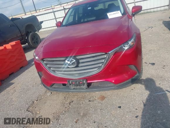 ✅ 2016 Mazda CX-9 Touring • VIN: JM3TCACY7G0116986 • Lot: 42140423. Listed on IAAI with 135,442 mi. Free auction sales archive from the USA and detailed vehicle history report at DreamBid. Image 6.