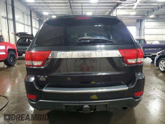 ✅ 2012 Jeep Grand Cherokee Overland • VIN: 1C4RJFCG0CC200346 • Lot: 85882075. Listed on Copart with 161,948 mi. Free auction sales archive from the USA and detailed vehicle history report at DreamBid. Image 6.