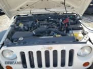 ✅ 2008 Jeep Wrangler X • VIN: 1J4FZ24128L612526 • Лот: 49152275. Опубликован ранее на Copart с пробегом 128 584 миль. Бесплатный доступ к архиву аукционных продаж из США и подробный отчёт об истории автомобиля на DreamBid. Изображение 11.